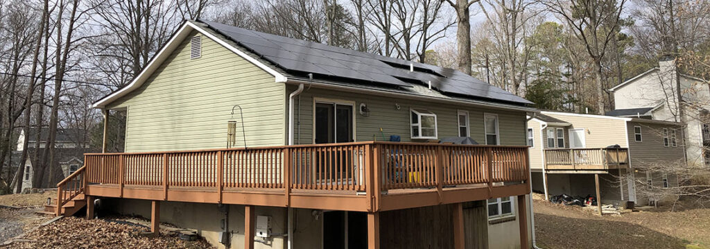 small home with solar panels on roof