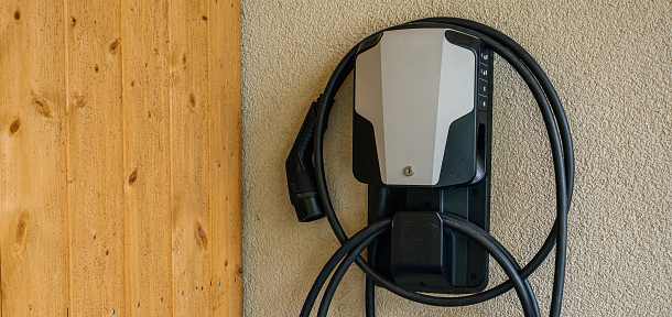 ev charger installed on garage wall