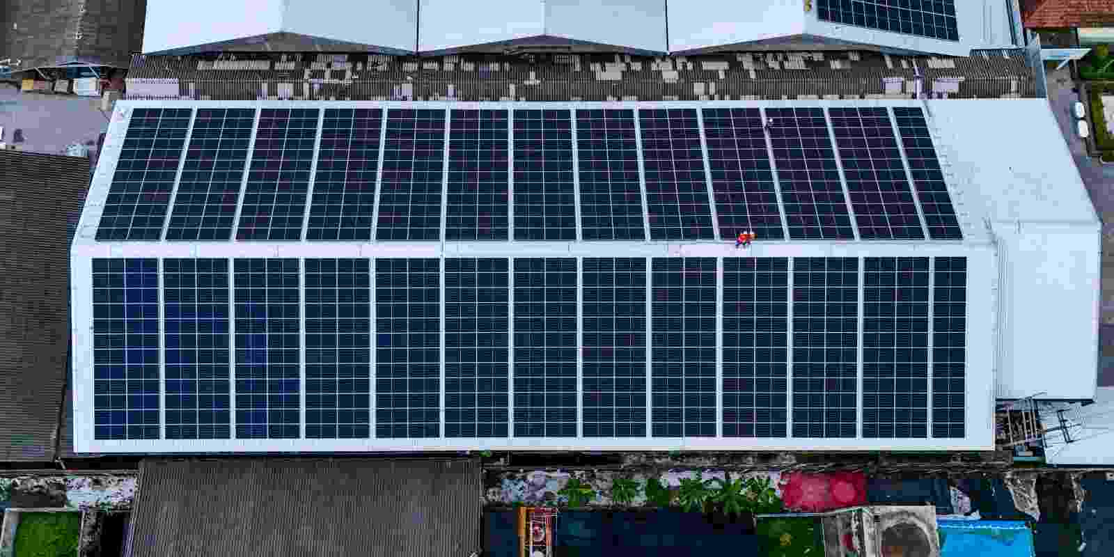 Solar Panels Installed on Metal Roof of Commercial Building