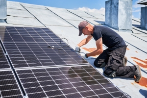 Local Solar Installer Installing Panels on House Rooftop in Maryland