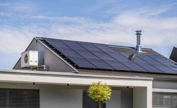 Modern House with Inverter Split System and Installed Solar Panels
