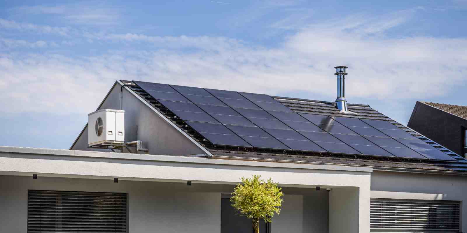 Modern House with Inverter Split System and Installed Solar Panels