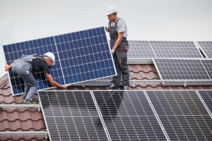 Local Solar Technicians Installing Panels on Home Rooftop in Maryland