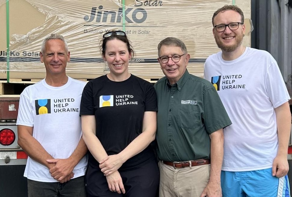 James Horstkamp of Energy Select with United Help Ukraine and Energy Impact team members loading donated solar panels for shipment to Ukraine.