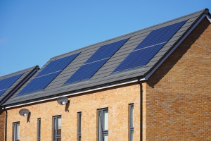 Solar Panels on Asphalt Rooftop of an Apartment House in Maryland