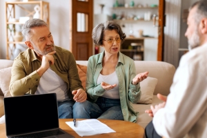 Homeowners Asking Questions to Insurance Agent About Solar Panels